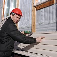 Affordable siding repair and maintenance services in Pinckney, MI